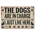 Letrero "dogs are in charge I just live here"